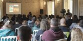 Personnes écoutant une conférence lors d'un Atelier lors de la Journée viticulture durable passons à l'action